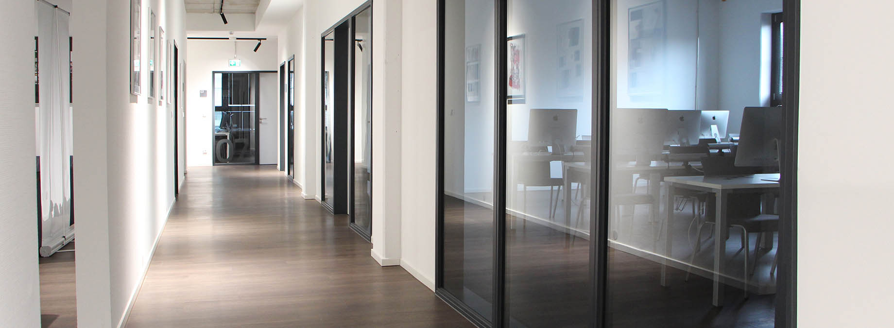 a floor in a building with white walls